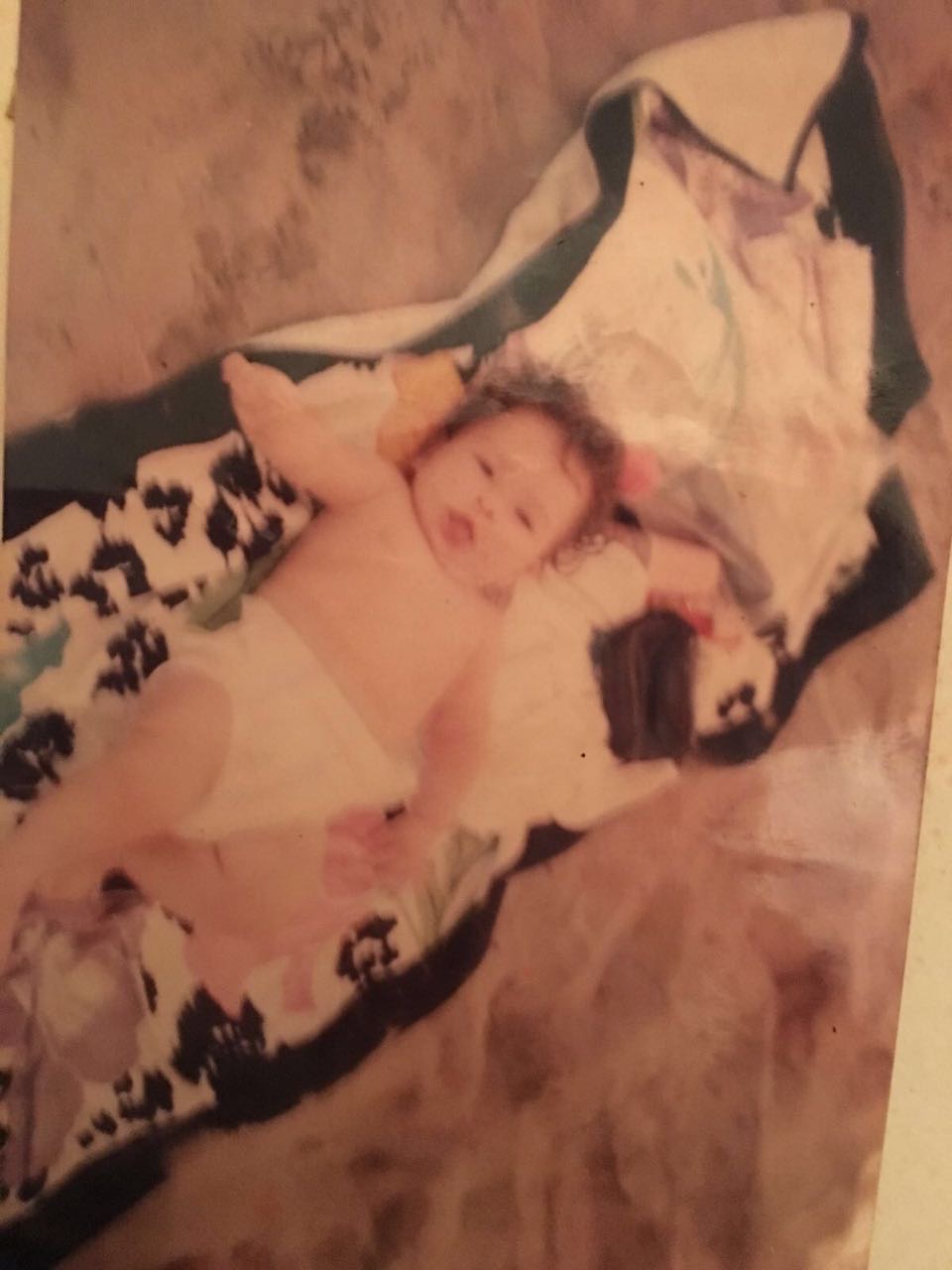 6-month-old baby Yoe at the beach - innocent beginning before trauma and ultimate triumph story